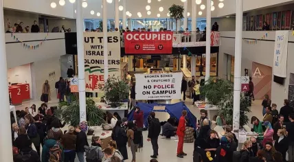 Students lead a protest inside the Roeterseiland campus of the University of Amsterdam. 16 May 2023
