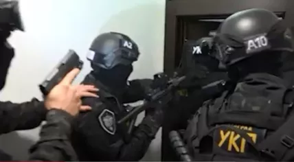 Police in Serbia raiding a home as part of an investigation to arrest the Balkan's biggest drug lords, 11 May 2023