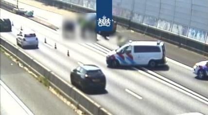 Rotterdam police arrest a man on the A20 highway toward Hoek van Holland just before the Kleinpolderplein junction, 29 May 2023