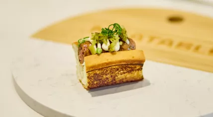 Meatable's lab-grown sausage in a bun during a taste test in Singapore. 4 May 2023