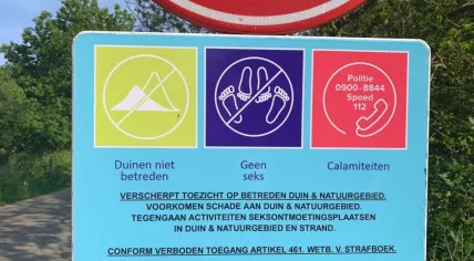Sign informing people they're not allowed to have sex on the Oranjezon nude beach in Veere, May 2023
