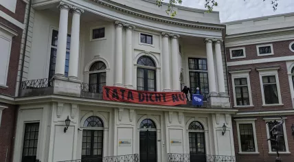 Extinction Rebellion activists hang banner and occupy the courtyard of the Noord-Holland provincial house, Paviljoen Welgelegen on Haarlemse Dreef.