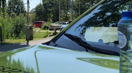 Heat Protocol: A Rijkswaterstaat car with bottled water standing ready to help motorists who break down in the heat