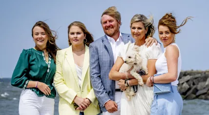 Princess Ariane, Princess Amalia, King Willem-Alexander, Princess Alexia, and Queen Máxima during their summer photo shoot on Zuiderstrand in The Hague. June 2023