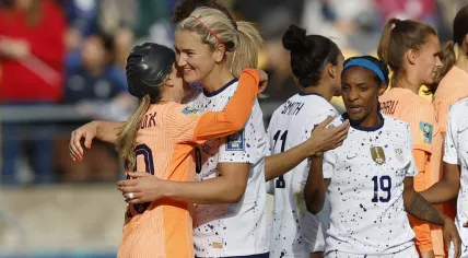 Lindsey Horan of the U.S. with Netherlands' Danielle van de Donk after the World Cup match. 27 July 2023