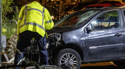 Police resuscitate a cyclist after he was hit by a getaway car used to flee the scene of a tobacconist robbery, 20 July 2023