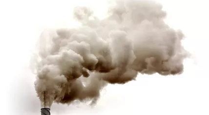 Smoke coming from an industrial chimney.