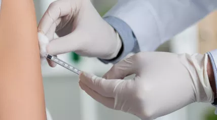 Woman is receiving a vaccination