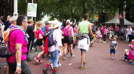 Walkers in the center of Nijmegen during the 2019 International Four Days Marches Nijmegen