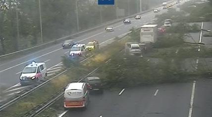 Vehicles trapped by trees which toppled over on the A9 during Storm Poly. 5 July 2023