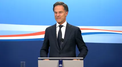 Caretaker Prime Minister Mark Rutte speaking with reporters on 14 July 2023
