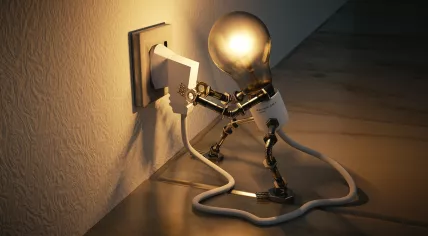 A lamp plugged into an electrical socket