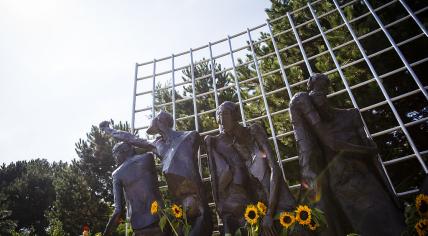 The Indisch Monument in The Hague covered in sunflowers to commemorate the victims and end of WWII in the former Dutch East Indies, 15 August 2014