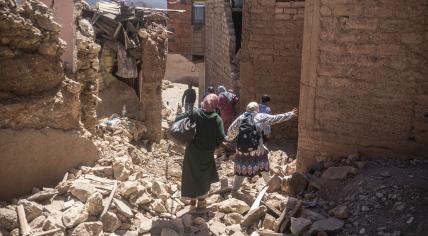 Residents flee their homes after an earthquake in Moulay Ibrahim village, near the epi centre of the earthquake, outside Marrakech, Morocco, Saturday, Sept. 9, 2023.