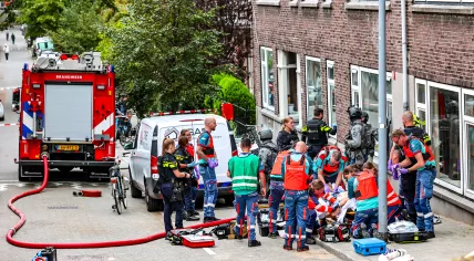 Medical personnel try rescuing one of two victims who died at a shooting on Heiman Dullaertplein in Rotterdam, moments before the suspected gunman killed a third at Erasmus Medical Center. 28 September 2023