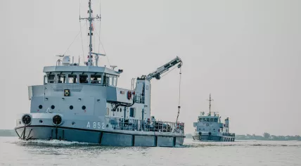 Defense diving vessels Argus (front) and Nautilus searching the IJsselmeer for two missing British WWII bombers, a Lancester and a Manchester, June 2021