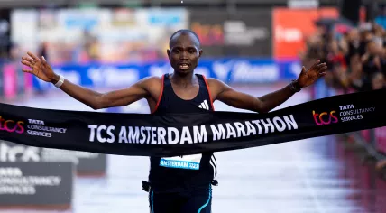 Joshua Belet from Kenya crosses the finish line of the 2023 TCS Amsterdam Marathon. 15 October 2023.