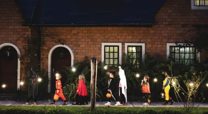 Kids in Halloween costumes