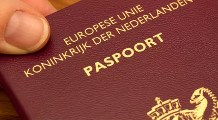 Close-up image of a Dutch passport in 2013