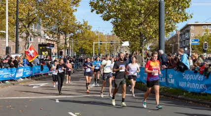 Runners approach the final checkpoint on Stadionweg during the 2022 Amsterdam Marathon. 16 Oct. 2022