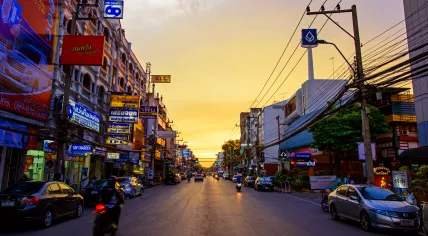A street in downtown Nakhon Ratchasima, Thailand, at dusk