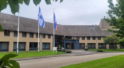 The Israeli flag flying in front of the Urk town hall following a flareup of violence between Israel and the Hamas movement, 10 October 2023