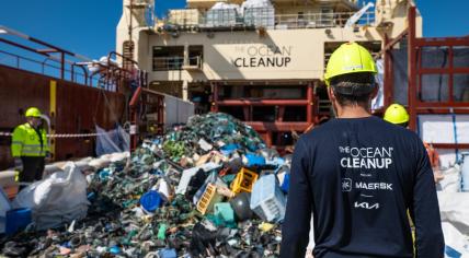 Crew sorting plastic on deck after System 03 extraction, August 2023.