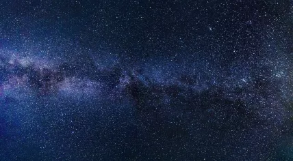 The night sky filled with stars and nebula clouds over Western Europe in 2017