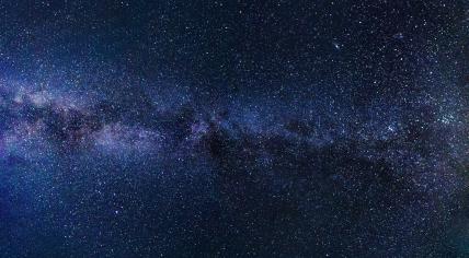 The night sky filled with stars and nebula clouds over Western Europe in 2017