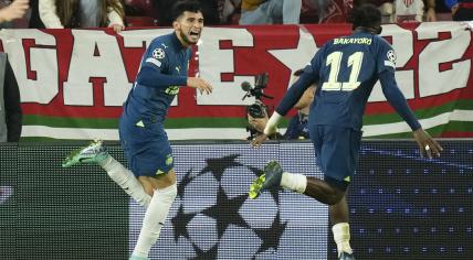 PSV's Ricardo Pepi celebrates after scoring his side's third goal during the Champions League Group B soccer match between Sevilla and PSV at the Ramon Sanchez-Pizjuan stadium in Seville, Spain, Wednesday, Nov.29, 2023.