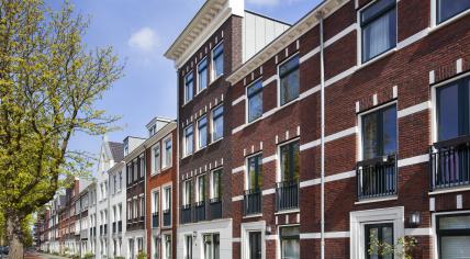 Street with new built classic style homes in Rotterdam