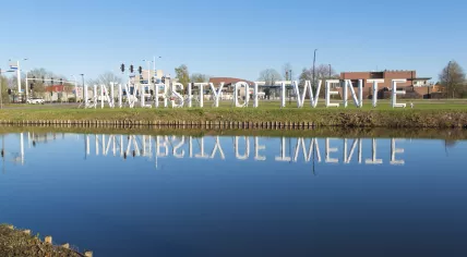 University of Twente logo reflected in the water