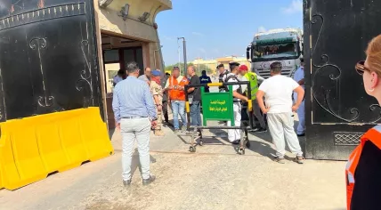 People waiting to cross the border from the Gaza Strip into Egypt, 2 November 2023