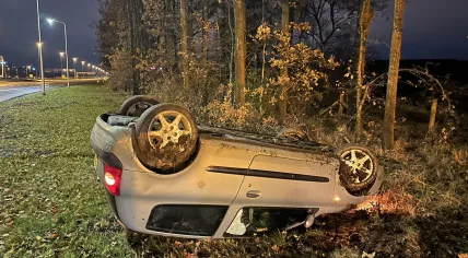 Overturned car on the Hoevelaken junction on an icy night; 28 November 2023