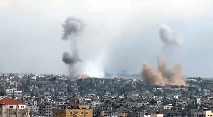 Smoke rising from Israeli airstrikes on the Gaza Strip, 7 October 2023