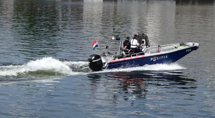 Archive photo of a police boat on the Maas River in Maastricht. May 2014