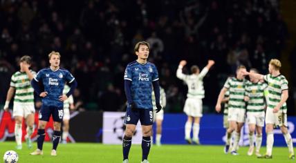 Thomas van den Belt of Feyenoord, Ayase Ueda of Feyenoord disappointed after the 2-1 during the UEFA Champions League match in group E between Celtic FC and Feyenoord at Celtic Park on 13 december 2023 in Glasgow, Scotland.