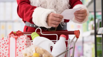 Santa Claus shopping at a supermarket
