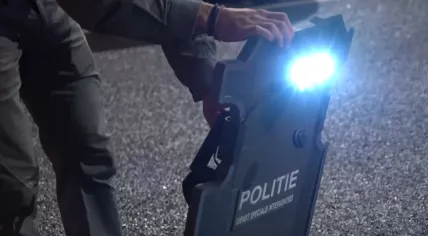 Dutch police from the Dienst Speciale Interventies (DSI) tactical team prepare equipment for a raid and arrest in a drug case. The investigation was a joint operation between authorities in the Netherlands, Spain and Colombia. 12 December 2023