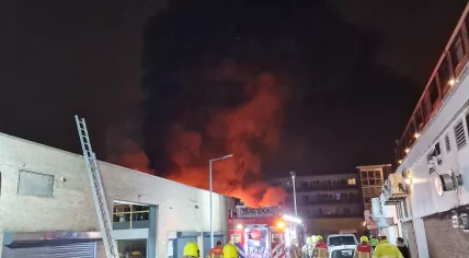 Firefighters attempt to tackle the flames after an explosion in a building on Schammenkamp in Rotterdam-Zuid. 29 January 2024