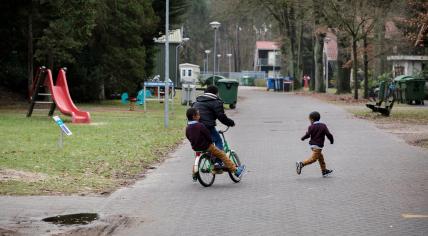 Undated photo of children playing outside at an residential complex for asylum seekers in the Netherlands