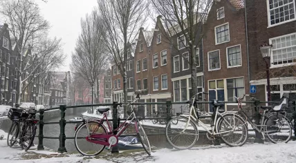 Snowing in the city of Amsterdam in the Netherlands