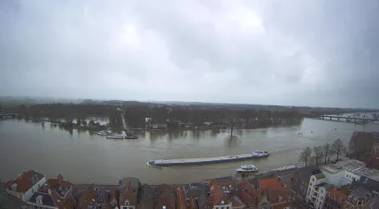 Storm clouds appear above the IJssel River in Deventer, where high water levels have persisted. 2 January 2024