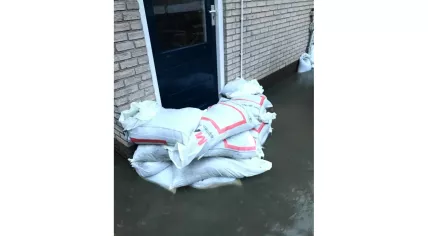 Sandbags placed around doors in Leerdam, Utrecht to prevent flooding from the Linge River. 5 January 2024