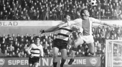 Ajax player Bennie Muller (R) squares off against Tonny van der Linden from DOS during a 2-2 draw in Utrecht. 8 November 1964
