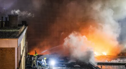 Firefighters fighting a massive fire caused by an explosion in an apartment building on Scammenkamp, 29 January 2024