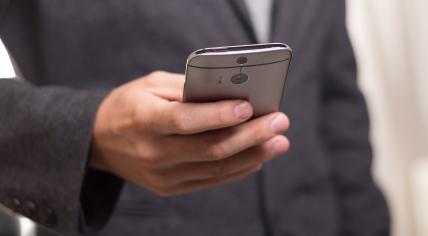 A man holding a smartphone