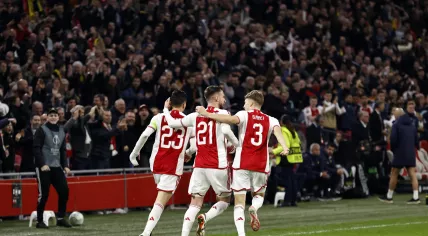 Steven Berghuis of Ajax, Branco van den Boomen of Ajax, Anton Gaaei of Ajax celebrate the 2-2 during the UEFA Conference League play-off match between Ajax Amsterdam and Bodo/Glimt at the Johan Cruijff ArenA on February 15, 2024 in Amsterdam, Netherlands .