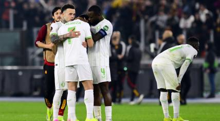 Quilindschy Hartman of Feyenoord, Alireza Jahanbaksh of Feyenoord, Lutsharel Geertruida of Feyenoord disappointed after the lost penalty shootout during the UEFA Europa League play-off match between AS Roma and Feyenoord at Stadio Olimpico on February 22, 2024 in Rome, Italy.