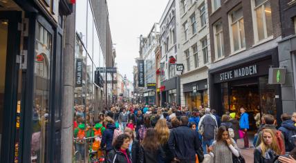 A crowded shopping street in Amsterdam